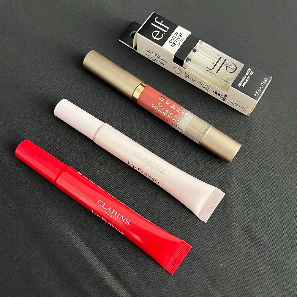 Four Lip Glosses (2x Clarins 1x e.l.f. 1x Stila)